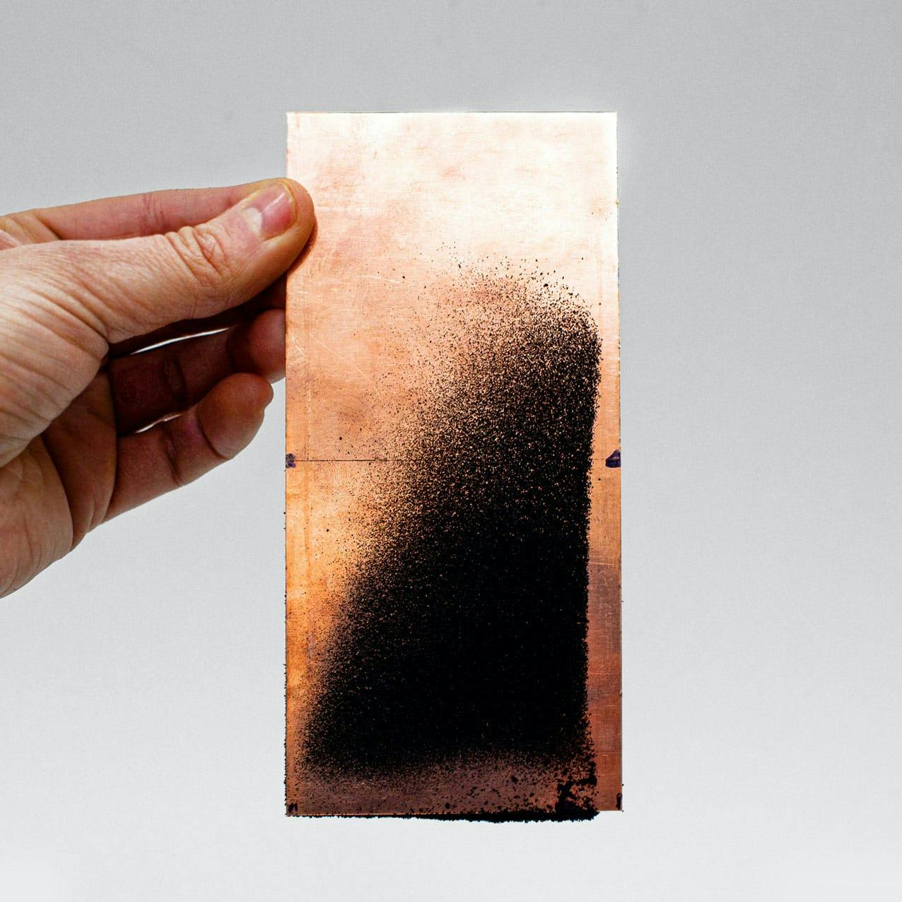 Microplastic Particles on Copper Plate. Source: The Tyre Collective